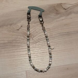 The CAEP beaded phone wristlet